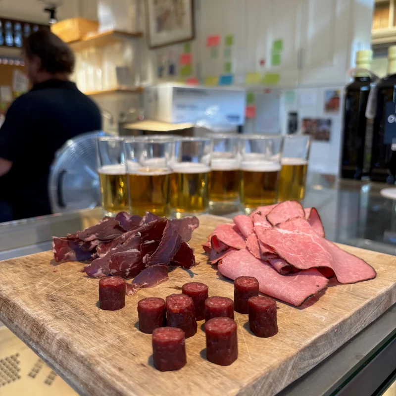 Small slices of Bear, Moose and Reindeer on a plate.