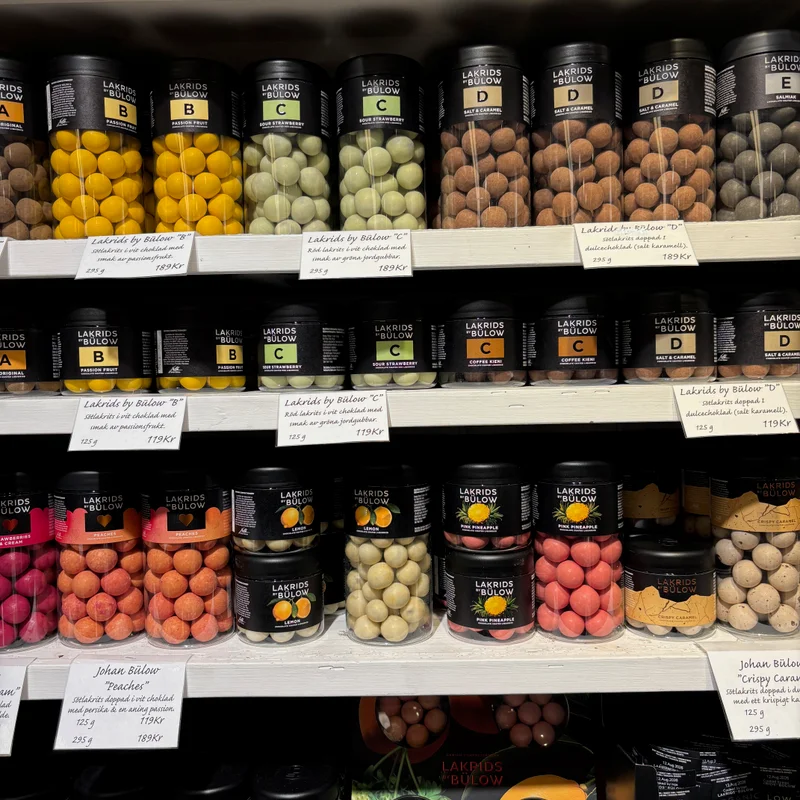 A shelf full of different flavours of liquorice.