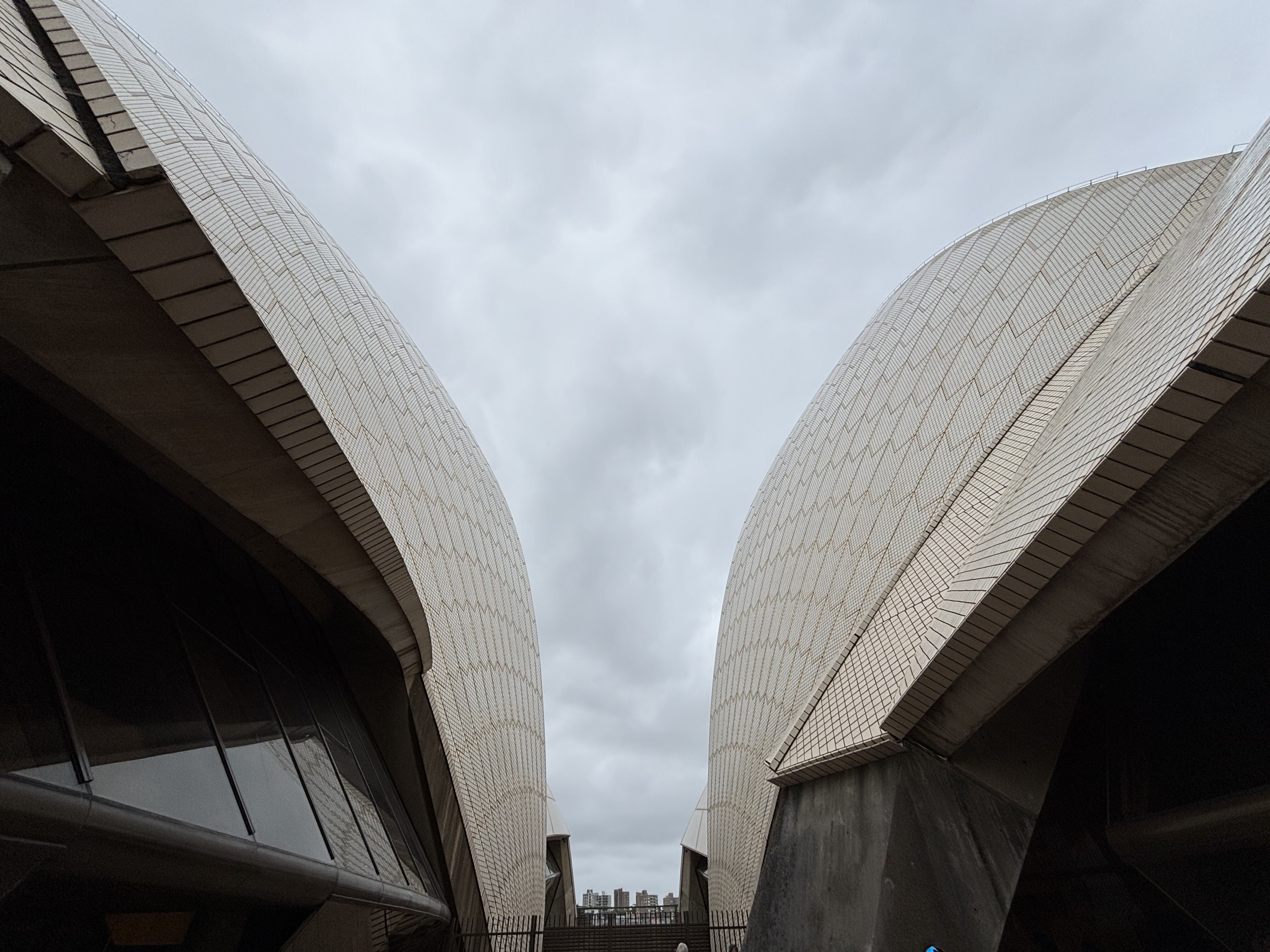 Between the folds of the Sydney Opera House.